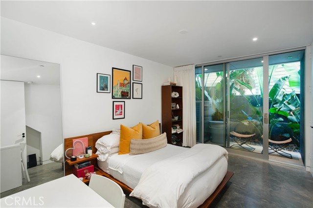 Lower Level bedroom 3 with patio