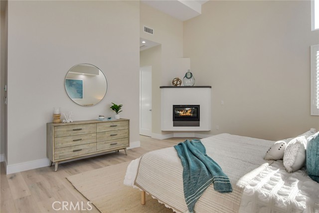 OWNERS BEDROOM WITH FIREPLACE