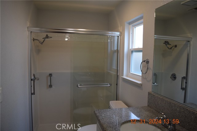 Master bath shower with grab bars.