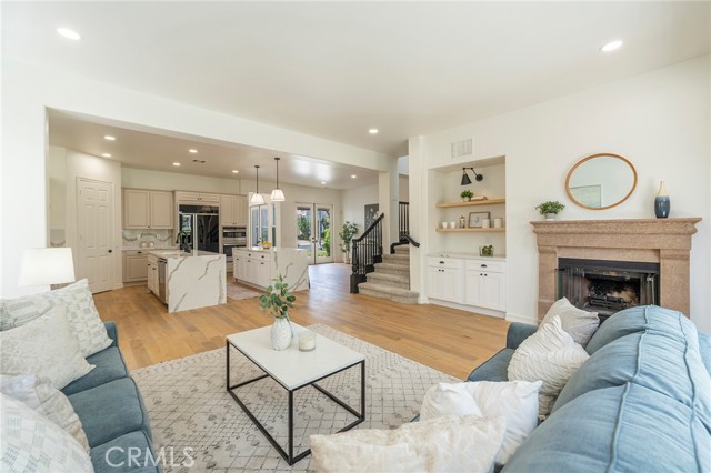 Family rooms opens up to the kitchen and leads to the backyard.