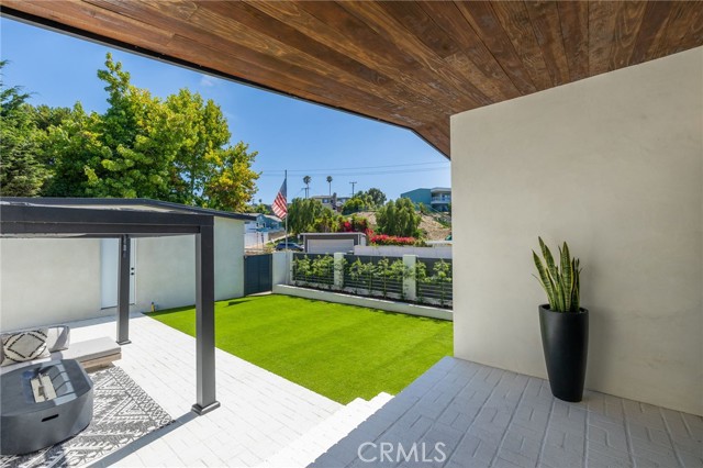 Private backyard with covered porch