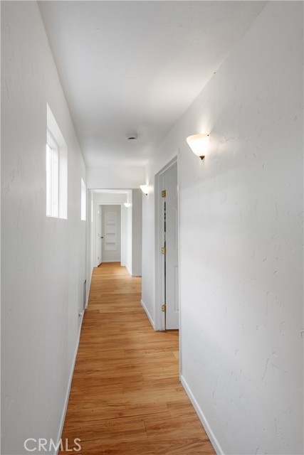 Lower level hallway to 3 bedrooms