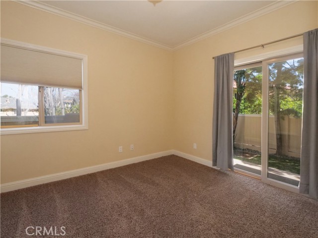 Bedroom #2 with access to rear yard.