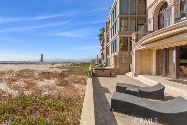6209 Ocean Front Playa del Rey, California Live like you're on vacation. Experience sunshine, sea breeze, salty air, sand and surf from this truly extraordinary home with awe-inspiring views on Playa's Silicon Beach Strand. Situated on the coveted north end of Playa del Rey's serene beach, this 2011-built custom home by acclaimed Tomaro Design Group features 4 bedrooms, 8 bathrooms and almost 7,300 sq ft of luxurious living space. Outstanding panoramic ocean views from Catalina to Malibu and sailboats drifting by in the nearby Marina Channel. Ultra refined beach living w/hi ceilings, Palladian doors opening to the sea, planked wood floors and dramatic light-filled central staircase in this elegant coastal estate. Unobstructed ocean views in the master w/stunning sunsets, sumptuous bath w/imported tiles and a bedroom-sized walk-in closet. This palatial residence is equipped with a professional chef kitchen w/breakfast bar and wood finishes. Fabulous oceanfront expansive family room w/full bar steps out to sunny and spacious patio on the beach; home theater/man cave w/epic-scale aquarium; lovely office, paneled library, home gym, elevator and immense roof deck w/swim spa, outdoor kitchen, fireplace and breathtaking 360 degree views.