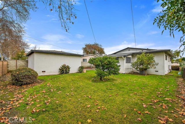 Large yard.  Detached garage at rear of property.  Lemon & Tangerine Trees