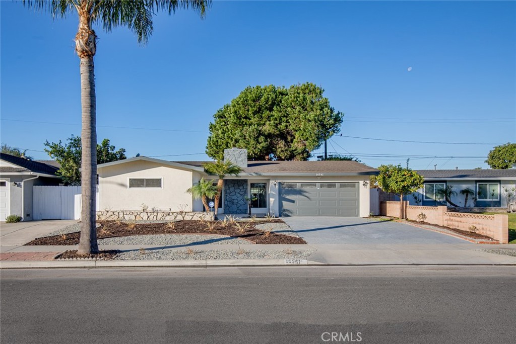 Welcome to a beautifully remodeled home nestled in a peaceful cul-de-sac in Huntington Beach. This charming residence features a modern open-concept design with high-end finishes throughout. The inviting living room boasts a cozy fireplace, perfect for relaxing evenings. The kitchen, equipped with sleek stainless steel appliances, granite countertops, and ample cabinet space. With its spacious layout and contemporary upgrades, this home offers the perfect balance of comfort and style. Enjoy the privacy of a cul-de-sac location, while being just minutes away from shopping, dining, and the beach!