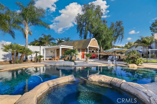 Let's go swimming! This pool has a baja shelf, newer pump and heater plus a diving board!