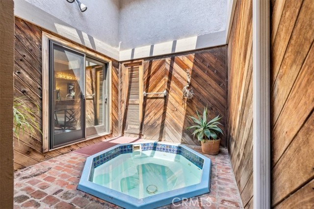 Private in-ground jacuzzi also with direct access to the primary bedroom