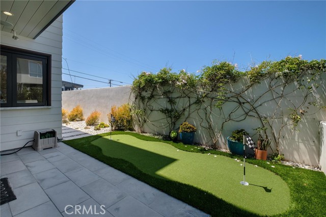 Bar opens to Backyard putting green