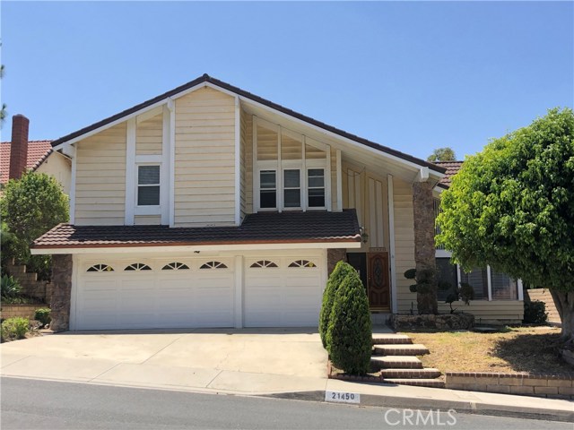 21450 Cold Spring Lane Diamond Bar, California A Spectacular Single Family House is located in desirable area of Diamond Bar. Situating on a hillside and a quite community, the lovely home is close to distinguished schools (Castle Rock Elementary, South Pointe Middle, and Diamond Bar High), recreation parks, shopping malls (walking distance to H Mart market), and easy access to 57/60 Fwy. This two story house features 5 bedrooms, 3 baths, generous great living room with soaring volume ceiling. The family room with a cozy fireplace and a mirror wet bar. The luxury master room with a spacious walk-in closet and large shower & bath tub. Gourmet kitchen. A 3-car attached garage. It has breathtaking sunset mountain view from the back yard. The wall has fresh painted and re-installed brand new wood floor through whole house.
