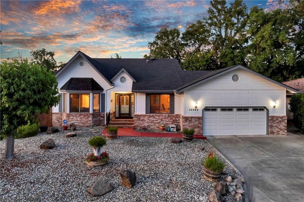 Charming Elegance & Outdoor Luxury in Hidden Valley Lake! This beautifully updated and thoughtfully designed home combines elegant interior features with an entertainer’s dream backyard—offering luxury, privacy, and comfort inside and out. Step through the front door into a bright and open living space where natural light pours in through large windows, highlighting the warm tones of the hardwood floors that run throughout the kitchen, laundry room, and bathrooms. The living room flows seamlessly into a formal dining space crowned by a unique turret ceiling, lending a touch of architectural drama that sets the tone for elegant dinners and special gatherings. The kitchen offers a blend of style and function with ample cabinetry, modern appliances, and gleaming hardwood floors. A nearby laundry room features the same flooring for a cohesive look, along with extra storage for everyday convenience. Retreat to the spacious primary bedroom suite, a true sanctuary with plush carpeting, a large walk-in closet, and an ensuite bathroom that offers a spa-like experience. Enjoy the luxury of a tiled wrap-around walk-in shower featuring dual shower heads! Newly installed vanities bring fresh elegance to all bathrooms throughout the home. Step outside and discover what truly sets this property apart: your own private resort-style backyard. Anchoring the outdoor space is a 49' saltwater pool with a depth of 3 to 9 feet, complete with solar and propane heating for year-round enjoyment. The professionally maintained pool equipment ensures everything runs smoothly, while the pergola provides the perfect shaded space. Host unforgettable gatherings at the custom hand-cut stone BBQ island, surrounded by meticulous concrete work and new fencing that ensures privacy. All pool and patio furniture are included, making this an effortless turnkey outdoor experience. Practicality meets comfort with a host of recent upgrades, including: New Roof (January 2021), New HVAC System (January 2020), Portable generator hook-up connected to the electrical panel, with propane-ready hook-up, New enlarged driveway offering extra parking space, Carpeted garage that’s clean and versatile for parking or hobbies. Every corner of this home—from the inviting interior to the stunning entertainer’s backyard—has been carefully curated for style, functionality, and comfort. Nestled in a tranquil, sought-after neighborhood with a rare sense of seclusion, this property is more than a home—it’s a lifestyle.