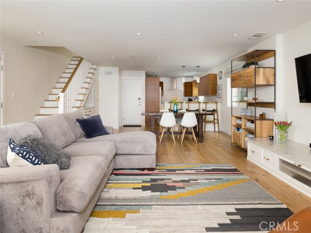 665 Washington Boulevard Venice, California Remodeled single family home located less than a mile from the beach! Your best bet for Venice living under $2M! Leave the car and take a short stroll to all the newest shops and restaurants, Venice Beach, Mother’s Beach, Marina, Venice Canals, Abbot Kinney and more. Enjoy the SoCal lifestyle with French doors opening from the open concept great room to a sun drenched patio with custom built-in BBQ and a lush and private front yard. The open layout living space features a custom corner high-end gas fireplace, recessed lighting, custom cabinetry and wide plank hardwood floors in a soothing beach tone. The updated kitchen boasts a breakfast bar, wine/beer fridge, farmhouse sink, stainless steel appliances and gorgeous granite countertops. A traditional floor plan with all bedrooms upstairs, the 4th bed/office and rear bedroom have beautiful views of the Santa Monica Mountains. The master suite includes a cantilevered sitting area with water views, large walk-in closet and luxurious master bath with oversized freestanding tub and huge walk-in shower with rain fixture and bench. A huge storage loft sits above the two car garage and additional upgrades include air conditioning, new double pane energy efficient windows and wireless home control including garage door, keyless entry, security system and Ecobee smart thermostat. Situated in the highly desirable Silver Triangle neighborhood of Venice, and across from a bird and wildlife sanctuary, the home is mapped to the award winning Coeur D'Alene Elementary School which is less than a 10 minute walk. Fully remodeled and with a Walk Score of 87, this is beach living at its finest. Don’t miss this opportunity to own your own turnkey beach home!
