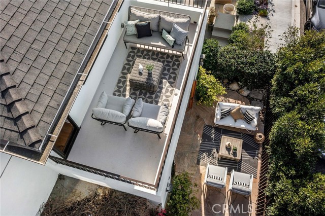 Aerial view of front patio and balcony.