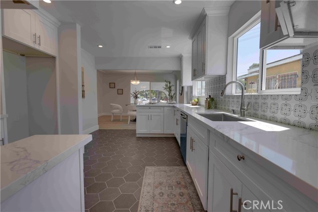 7731 Normandie Avenue, Los Angeles, California 90044, 3 Bedrooms Bedrooms, ,2 BathroomsBathrooms,Single Family Residence,For Sale,Normandie,DW24173483