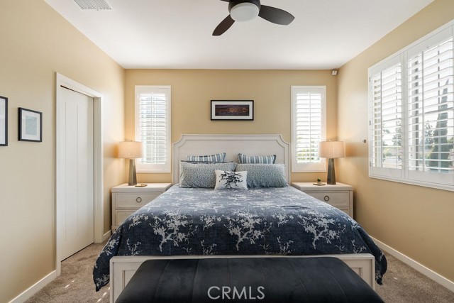 Primary bedroom easily fits king bed