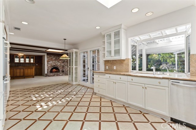 Skylight, garden window, French doors.