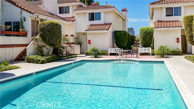 2720 Gramercy Avenue 3 Torrance, California LOWEST PRICED TOWN HOME IN OLD TORRANCE AND PET FRIENDLY!
Bright and sunny location with a fabulous floor plan in quaint Old Torrance. This seamless floor plan is perfect for entertaining. The kitchen flows into the dining & living room joining the two patio areas. REMODELED KITCHEN with beautiful custom Maple cabinets finished in a rich Maple Coffee Glaze and warm Granite Counter tops & a breakfast bar. Entertaining is a breeze with an over sized stainless steel built in refrigerator. Start your mornings off in the spacious kitchen nook with plenty of natural sunlight sprawling in through the picture window overlooking the patio.
Two spacious bedrooms with high vaulted ceilings, extra storage & closets both large enough for CAL KING bedroom sets. The master boasts a sitting area or small office area with PV and sunset views. Laundry area located in the hall between both bedrooms.
Upgrades included: Dual pane windows/2011~New Front Door & retractable screen ~2 car enc. Gar. New door ~Water Heater/2004 ~ Remodeled Kitchen/2009 ~ washer/dryer included ~ Deck coating resurfaced and more.
Gramercy Gardens East is an 18 unit gated complex. Nestled in lush landscaped grounds. Pool & Jacuzzi. Low HOA dues of $320/mo. INCLUDES ALL EXCEPT GAS, ELECTRIC, PHONE AND CABLE. NOT FHA APPROVED. PET FRIENDLY see supplement on rules and Regs.
Conveniently located to Old Torrance Park, Del Amo Fashion center, FRWY'S & AWARD WINNING TORRANCE SCHOOLS.
