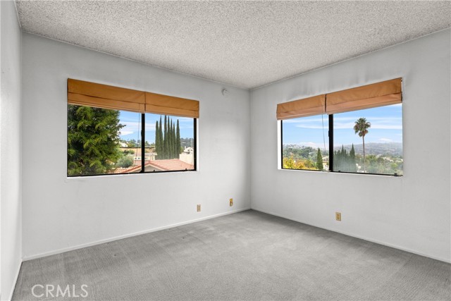 Bedroom #4.  Large enough for a King size bed.  Two windows for more Incredible Views.  Tons of natural lighting.