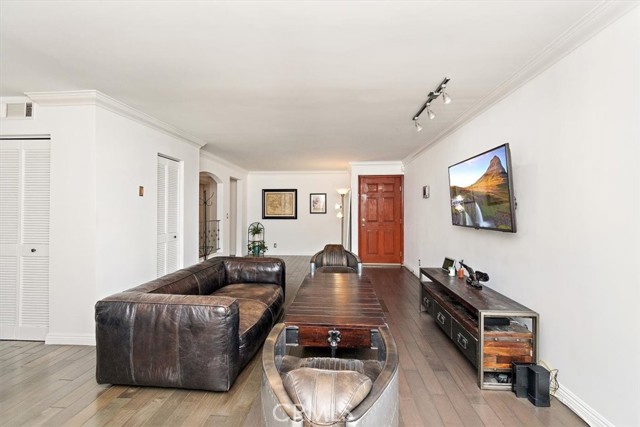 1154 S Barrington Avenue 108 Brentwood, California Welcome to the highly desirable Brentwood Villas Community! This absolutely stunning first floor unit facing the quieter side, off Goshen greets you with a fantastic open floor plan living room, abundance of natural lighting, new hardwood floors throughout, updated bathroom, new recessed lighting, crown molding and dual pane sliding glass door opening to balcony. Kitchen has been updated and perfect for the chef in the family with quartz counter tops, walk-in pantry, stainless steel appliances, custom cabinetry, modern tile flooring and gorgeous backsplash. As you make your way down stairs you are greeted with two spacious master bedroom suites fully updated bathrooms in each and inside laundry with stackable washer & dryer. As a cherry on top, the building was fully renovated in 2006 offering a recently remodeled gym, heated indoor/outdoor pool, gated parking with a 2-car tandem parking, security cameras & controlled access and well-kept Sauna which makes for a perfect way to end your day. A gem! This immaculate 2 bedroom and 3 bath condominium is centrally located in Brentwood within distance to many upscale shops, restaurants, coffee houses, Whole Foods and all the Brentwood has to offer!