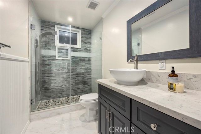 Downstairs bathroom with walk in shower