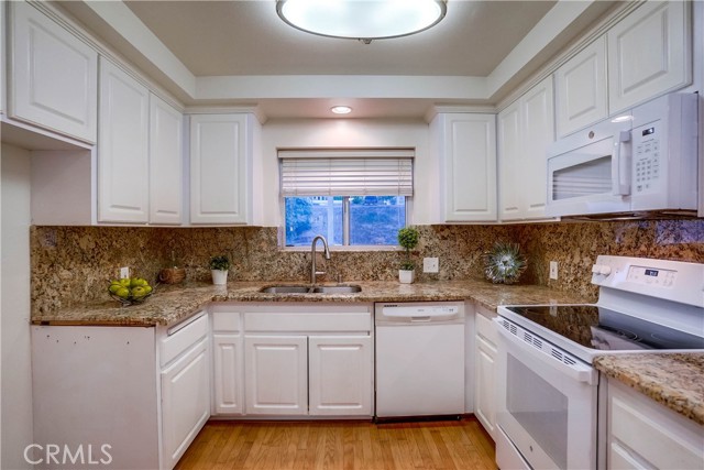 Spacious, updated Kitchen with Granite Counters,  plenty of cabinets and built in appliances Spacious, updated Kitchen with Granite Counters,  plenty of cabinets and built in appliances