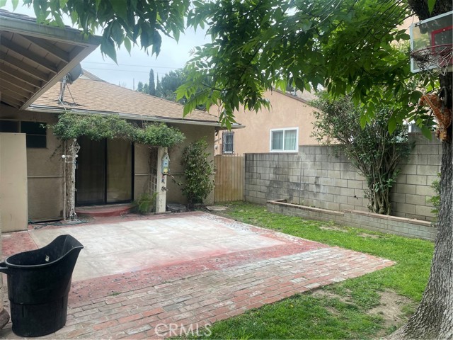 Backyard concrete/brick area