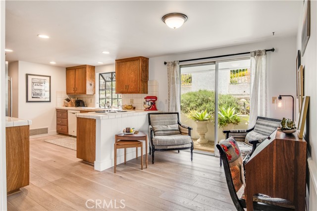 sliding doors and abundant light in kitchen also