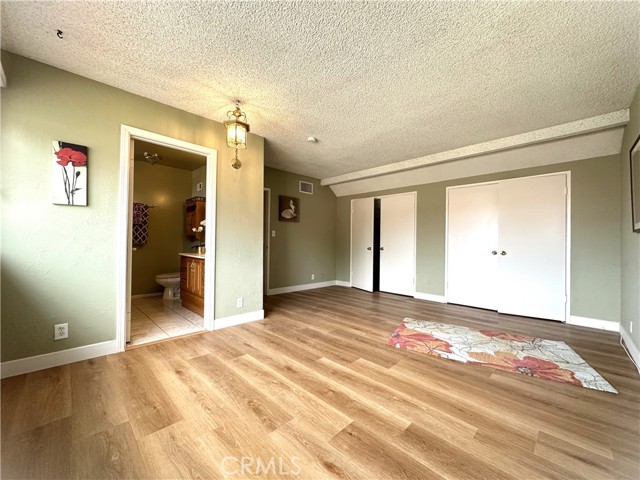 Primary Bedroom- large wardrobe closets, own bathroom suite