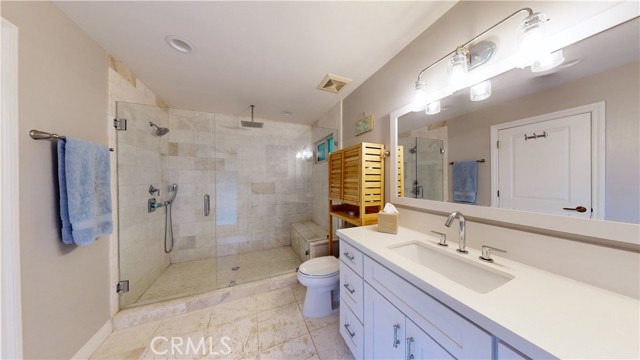 Bathroom off of kitchen with access to pool.  No need to drip through the house.