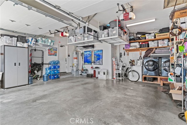 full 2 car garage with storage & laundry