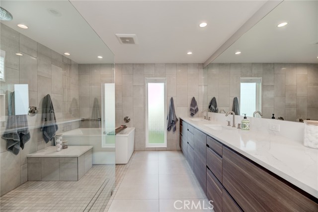 master bath with heated floors and 11' long dual sink vanity