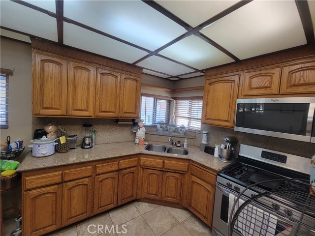 Front Unit - Remodeled Kitchen with Oak Cabinets and Granite Kitchen Countertop