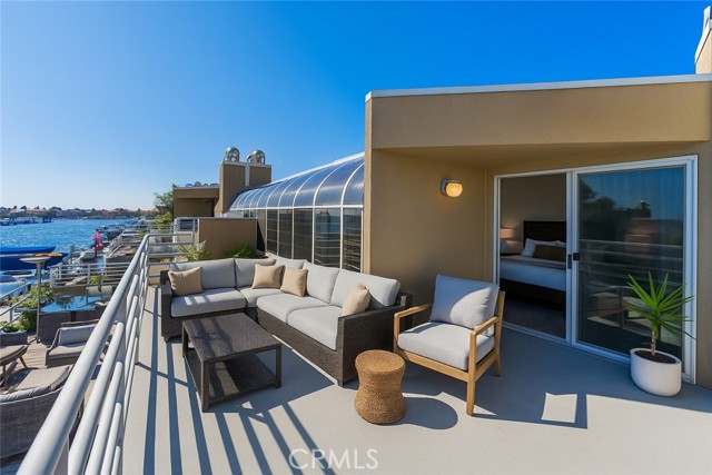 Virtually Staged-Primary bedroom balcony.