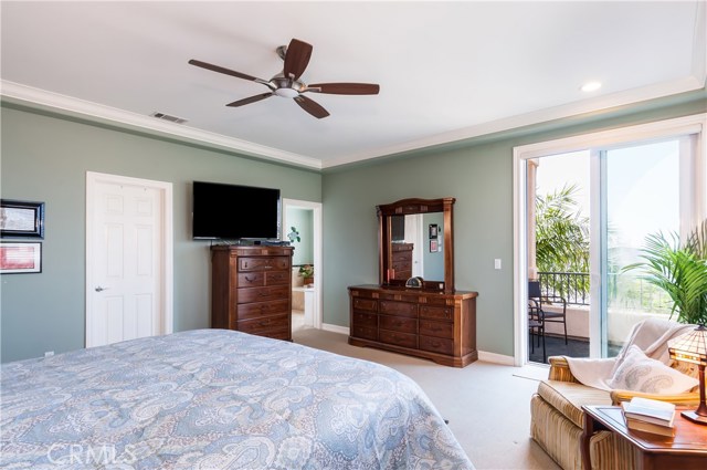 Master Suite has two walk-in closets, private en-suite bath, ceiling fan.