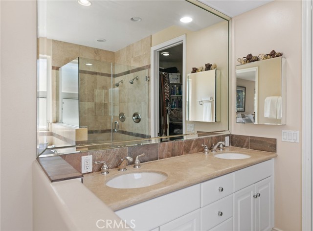 Dual vanity in en suite bathroom.