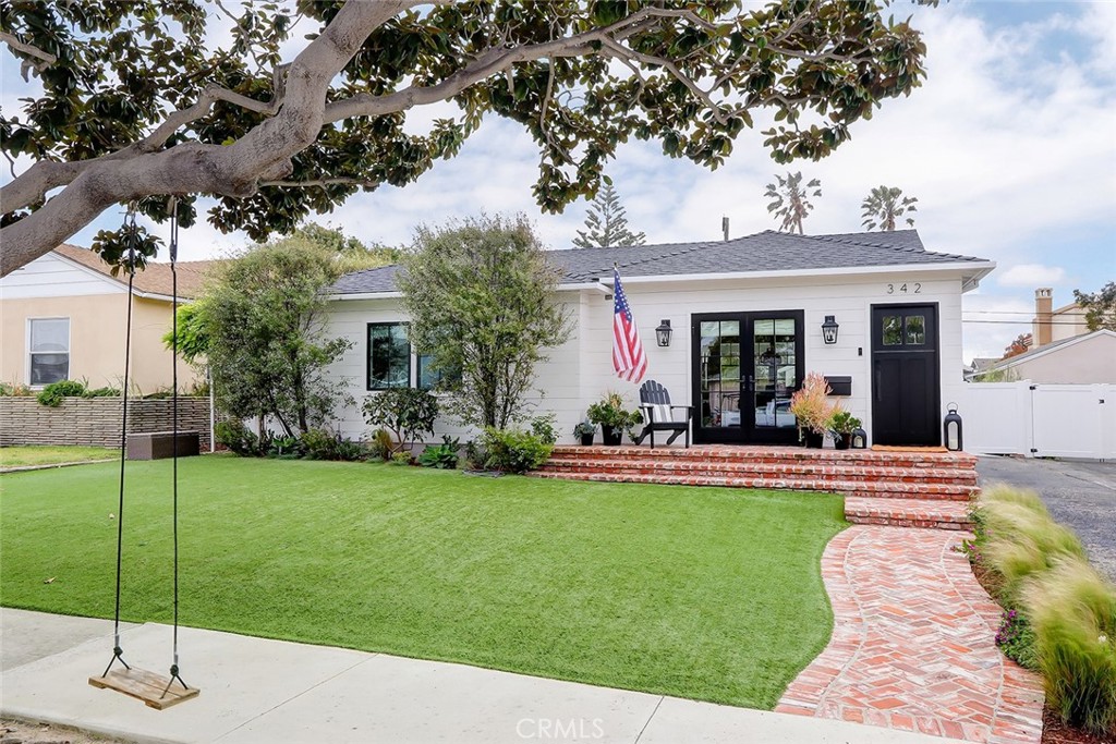 A rare opportunity in the Avenues! Designer ready, with no detail overlooked. Timeless and traditional coastal aesthetic, allows for you to move right in and make it your own.  Open floor plan perfect for entertaining on summer nights, complete with a covered heated patio, firepit and custom built outdoor BBQ area.  Custom kitchen with shaker cabinets, quartz counters, and all Viking stainless appliances, with an adjacent built-in dining area and custom carrera dining table that compliments the space. Wide plank oak flooring, crisp tongue and groove wall features,  built-in storage features, woven roman shades...the amenities are endless.  Owner's suite features a walk in-closet, spacious ensuite bath with double vanity, floor to ceiling honed marble, and a patio that opens right out to the lush backyard gardens.  Within walking distance to the beach (the shops & restaurants in Redondo Village), rinse off the sand in the outdoor shower before hopping  in the hot tub to warm up.  Detached 190 sq ft private office space set back within the garden is ideal for working from home, a home gym, or double as a guest room when friends stay over.  BONUS detached garage is actually a fully finished family room - perfect for games,  movie nights or watching the game.  The play loft with picture port hole window makes it even more fun for kids & sleepovers.  Don't miss the hidden storage room, with plenty of space to hide bikes, surfboards and your 2nd full size fridge.  This home is charming and one-of-a-kind, it will steal your heart & won't be on the market long!