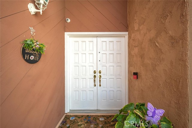 Elegant double-door entry elevates the quality standards to the home.