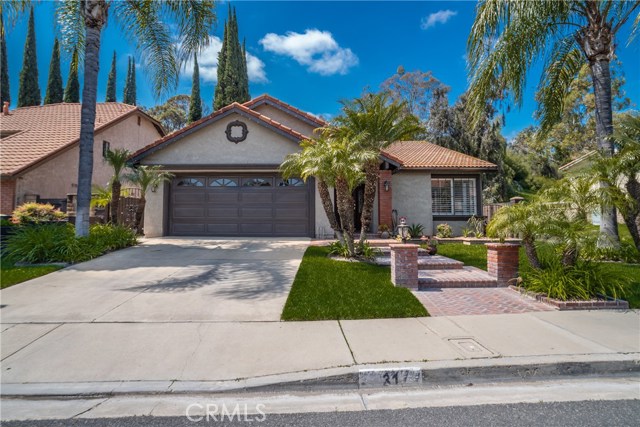 31 Rainbow Ridge Road Pomona, California Model Perfect SINGLE-STORY Home Shows BEAUTIFULLY!! UPGRADES & Improvements Throughout * Wonderful Views of the Mountains/Hills, Valley & City Lights * Spacious Floor-Plan Offering 1817 sqft with 3 LARGE Bedrooms & 2 FULL Bathrooms * GOURMET Island Kitchen w/GRANITE COUNTERS & FULL Back-Splash, Breakfast Counter for the Kids, STAINLESS STEEL Appliances (with Fridge) and Breakfast Nook * OPEN FLOOR CONCEPT with Large Family Room * BACKYARD Maticulously Landscaped with Stack Stone Planters, PLENTY of GRASS for the Kids to PLAY or add your CUSTOM POOL * Spacious Master Bedroom Suite with High Ceilings and Master Bathroom with DUAL Sinks & Walk-In Closet * UPGRADED Throughout w/FRIEZE CARPET, Designer Fixtures, Custom Stack Stone Fireplace, Plantation Shutters, Travertine Tiled Floors, Upgraded Cabinetry with Self-Close Drawers, Granite Counters, Raised Panel DECOR Doors, Rain Gutters, Ceiling Fans & MUCH MORE * OVER-SIZED 2 CAR Attached GARAGE with CUSTOM Stain Resistant Vinyl Coated Flooring & Large Storage Cabinets * TERRIFIC Curb Appeal * HIGHLY DESIRABLE Location and Close to Schools, Shopping, Dining/Restaurants, Parks and EZ Freeway Access*