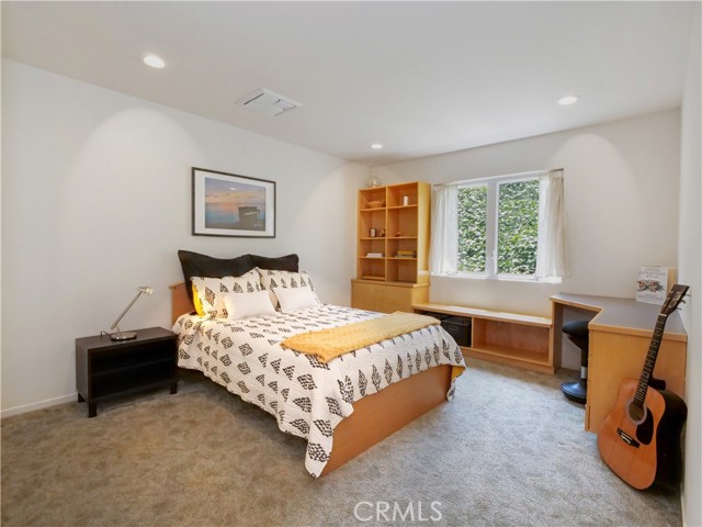 Second Bedroom with Built-in Desk & Drawers