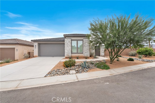 80029 Canyon Club Court Indio, California Spectacular single level pool home offered in the exclusive gated community at Gallery Indian Springs. Located in a cul de sac on the largest lot in the development, this 3 bed 3 bath home is approximately 2,114 sq ft and has been completely upgraded with the highest quality materials and most popular design features. The fabulous kitchen is open to the family room with a large center island, dark grey stone countertops, white custom cabinets, high end stainless steel appliances, pendant lighting and plenty of storage. Large sliding doors leading out to the pool area and California room provide easy access and plenty of natural light. The master bedroom with ceiling fan and sliding door leading out to the backyard includes a spa like Master Bath featuring dual sinks, step in shower and large walk in closet. There are two other fully upgraded bathrooms, two more bedrooms with ceiling fans and an inside laundry room. All furnishings included! Plus low HOA and plenty of great local activities including a short stroll to the Big Rock Pub and Golf Course. This is a must see!