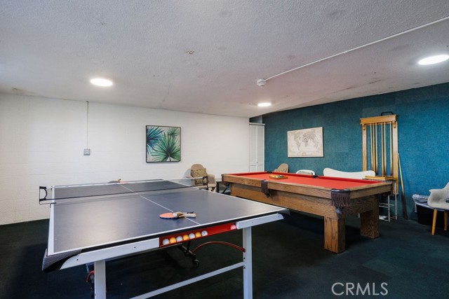 Community recreation room with table tennis and billiards