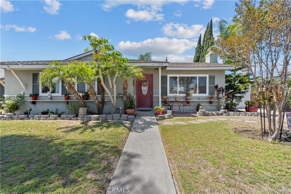 13581 Paysen Drive Westminster, California Designed with your comfort in mind, this beautiful 4 bedroom 3 bath home features a welcoming interior and incorporates a flow-through living/dining area in a desirable neighborhood of Westminster. The space-efficient kitchen has been beautifully updated and contains tile flooring, quartz countertops, and self closing cabinets. Equipped with lots of extra space, the expansive master bedroom includes a spacious bathroom and a walk-in closet. Adding appeal to the home are clean and well maintained hardwood floors throughout the main living spaces. The backyard features a covered patio, fruit trees, and a 2 car detached garage that can be used as a family/game room or traditional storage area. The go-to spot for year-round fun. Are you looking for suburban living at its finest? Nestled in a quiet Orange County neighborhood? This unique home won't last long. Call today!