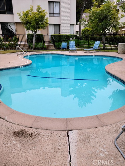 Small pool in front of townhouse