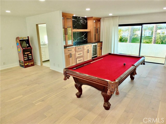 Huge Bonus Recreation Room with Bar, Refrigerator, Patio and En Suite over the Northern Garage with Balcony