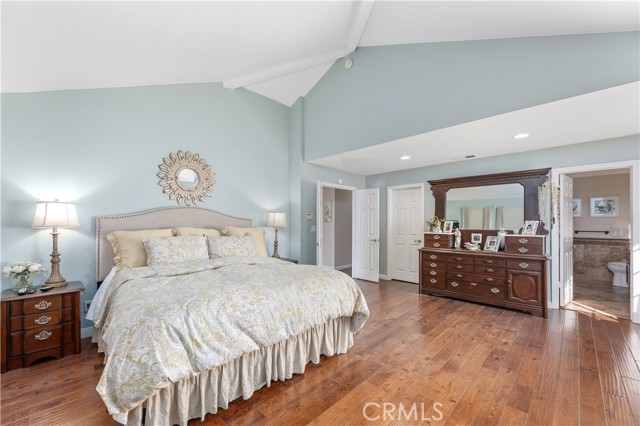 Vaulted ceiling and gorgeous hardwood floors throughout