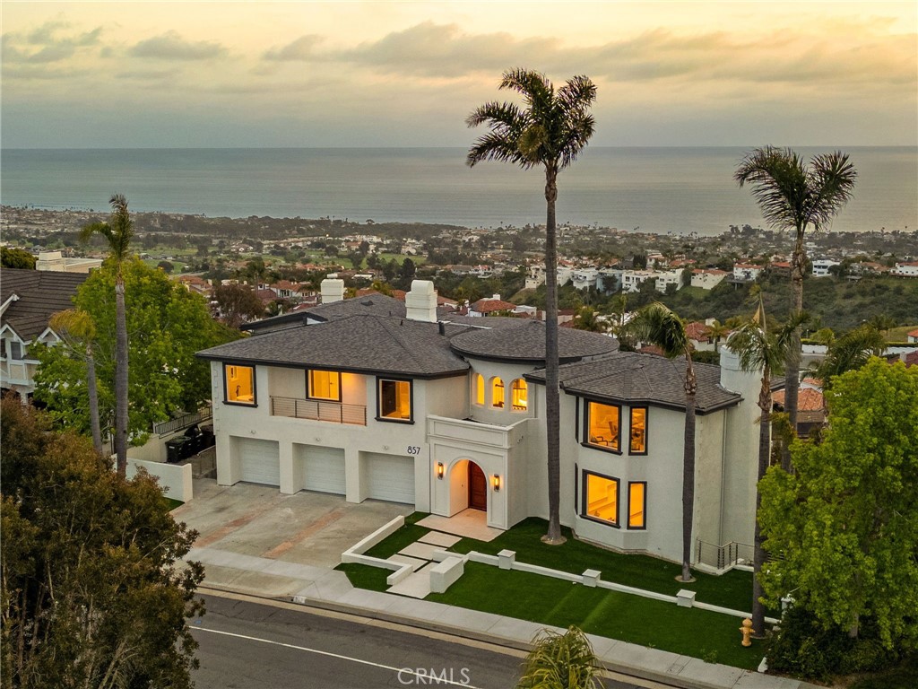 This stunning custom estate in San Clemente offers an unparalleled blend of luxury, size, and breathtaking views. With nearly 7,000 square feet of refined living space, this fully renovated 5-bedroom, 6-bathroom residence is designed to capture panoramic ocean, canyon, and mountain views from every room and its five unique balconies.

Property highlights include:
 • Expansive interior layout of approximately 7,000 sq ft
 • Five balconies, each offering unobstructed ocean and mountain vistas
 • Rare single loaded street location for maximum privacy and tranquility
 • Wine cellar and private sauna for ultimate relaxation
 • Two exceptionally large primary suites located on the first and third floors
 • Huge family room, perfect for gatherings and entertaining
 • Dedicated office space featuring rare dual views of both the canyon and coastline
 • Fully permitted renovation with modern, high-end finishes
 • Three-car garage for ample parking

This is more than a home—it’s a lifestyle of luxury and serenity, where every corner frames a cinematic backdrop of San Clemente’s coastal beauty. Don’t miss this rare opportunity to own a home that truly has it all.