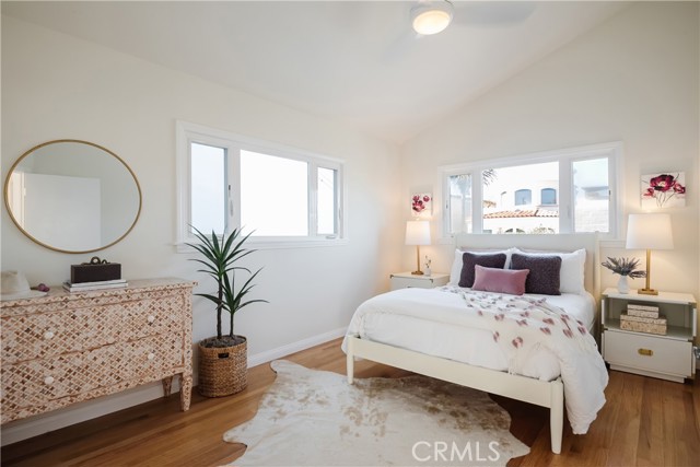 Guest Bedroom with Vaulted Ceilings