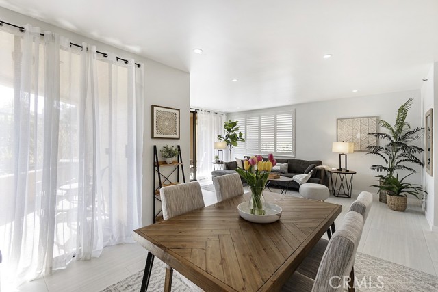 Dining room with large sliders leading to patio