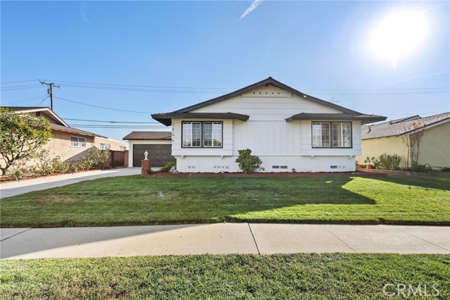 Welcome to your dream home! Step into this newly updated 3-bedroom, 2.5 bathroom home. As you enter the spacious living room, you'll be captivated by the spacious living space enhanced by new recessed lighting and elegant waterproof flooring throughout the home. The home features newly remodeled kitchen, featuring brand-new cabinets, quartz countertops & new plumbing fixtures. Also comes with new stainless-steel appliances—including a range, microwave and dishwasher. This home also includes brand central air and heating for year-round comfort. Step outside to discover a large attached 2 car garage with ample driveway space and a good size backyard, perfect for outdoor living and entertainment.  The home is situated in a highly desirable neighborhood, this home provides convenient access to local amenities, major freeways, parks, schools and the beaches. Don't miss out on this incredible gem—schedule your viewing today and make this dream home yours.