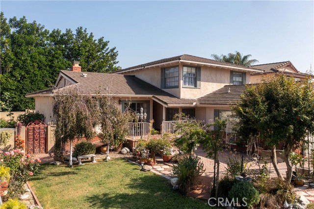 Lots of mature landscaping on this corner lot home